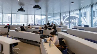 Students learning in classroom of Columbia Business School 