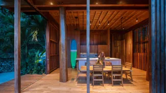 woman in interior of Costa Rica Treehouse at dusk