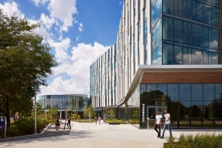 Exterior entrance of University of Illinois at Chicago, Academic and Residential Complex (UIC ARC) on a sunny day