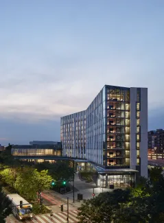 Exterior of University of Illinois at Chicago, Academic and Residential Complex (UIC ARC) at sunset.