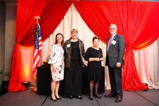 Georgi Ann Bailey receiving an award