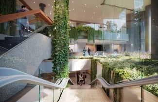 A view from the top of the stairs looking into the lobby and courtyard areas.