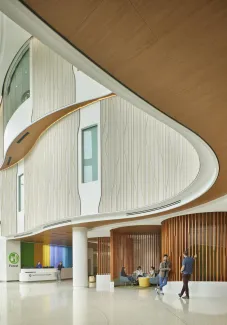 A dramatic, three-level atrium inside the Seattle Children's Building Care, draws families and visitors in through the new front door and creates a gateway to the rest of campus.