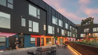 The deck is programmed with seating areas, gravel lounge pits and a turfed dog park. playful angular geometry and colorful walls enliven the building’s common spaces throughout.