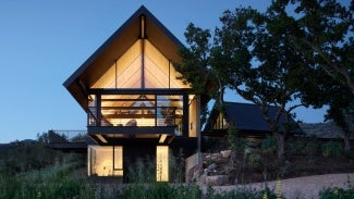 Three Gables home exterior at dusk