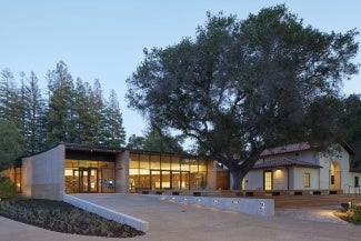 Exterior of Atherton Library at dusk.