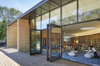 Exterior entrance of Atherton Library with doors open.