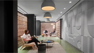 Three people reading at Convene Events Center At Willis Tower, Chicago