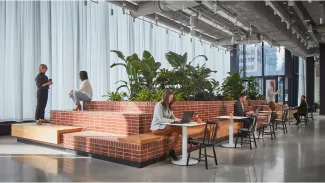 Large open space with tables inside Convene Events Center At Willis Tower, Chicago