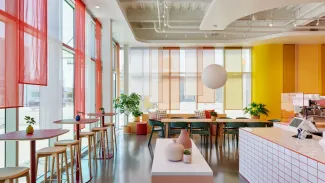 Interior of Liberation Coffee House with a focus on colorful window treatments