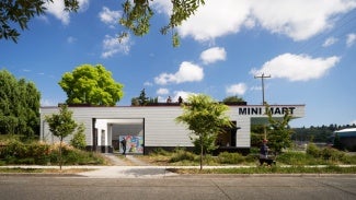 Exterior of Mini Mart City Park on a sunny day, view from the street