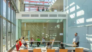 Classroom with sun shining in at Seattle Academy of Arts and Sciences Middle School 