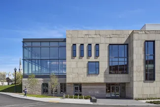 Rear exterior of Woburn Public Library on a sunny day.