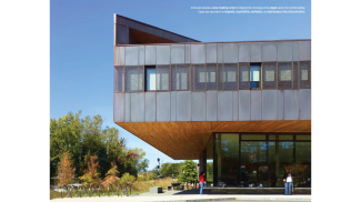 Solar-shading screen is integrated in the design of the copper panels that clad the building. 