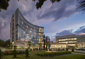 exterior of hospital center at dusk