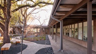 covered porch area with courtyard