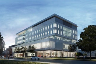 Rendering of an academic building with a Street View. The building has large glass windows. 