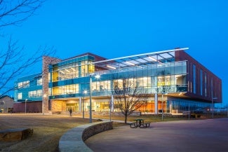 Exterior of a science building at night. 