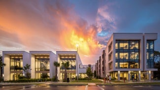 External shot of a building at sunset.