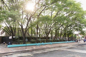 The Refreshing Waters includes a painted concrete ledge, movable chairs, outdoor fans, and misting line.