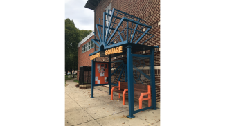 Bus Shelter at Linwood Avenue and East Fayette Street in Baltimore.