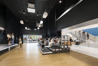 The heart of the school includes a new black box theater that opens to both the entry and the dining beyond.