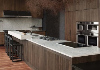 An expansive island in the center of The Professional Kitchen