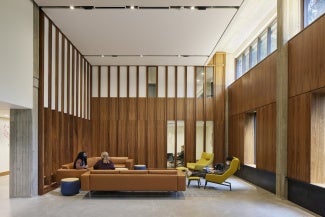 To create a thriving neighborhood for students and student life, dormitory rooms have been designed above pedestrian levels. Ground floors are programmed with student amenities, including lounges, dining and grocery, student services, classrooms and maker spaces, and large meeting rooms that promote and foster connections.
