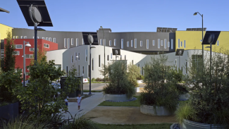 Colorful building that consists of yellow, grey and red