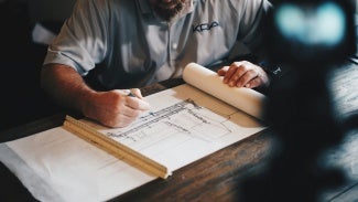 Architect drawing a design