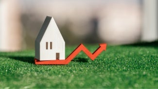 abstract photo illustration rising insurance costs for building