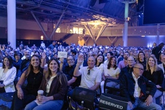 An enthusiastic audience attends the Day 1 general session.