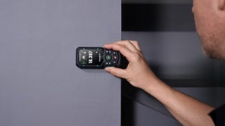 A laser distance meter’s detailed display