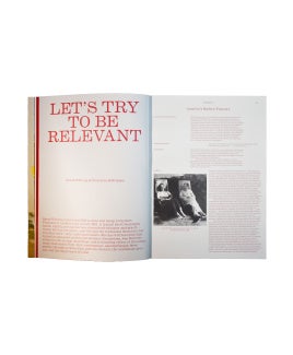 A copy of Harvard Design Magazine #48 opened up to a piece written by Sarah W.