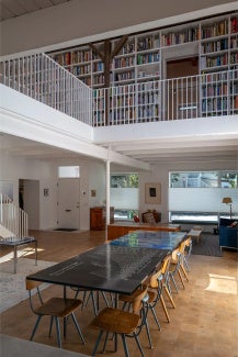 A double-height atrium in 33 Bristol Street by WW Architecture.