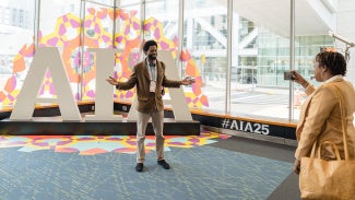 Two attendees at a conference