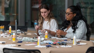 Participants crafting at an event held at the AIA Global Campus
