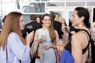 three women chatting hilton bayfront san diego aia26 opening night party