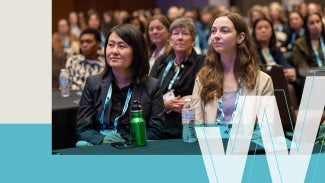 Women looking towards stage at AIA Women's Leadership Summit