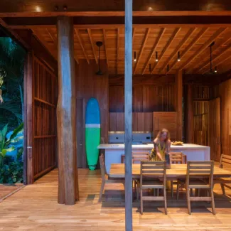 woman in interior of Costa Rica Treehouse at dusk