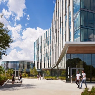 Exterior entrance of University of Illinois at Chicago, Academic and Residential Complex (UIC ARC) on a sunny day