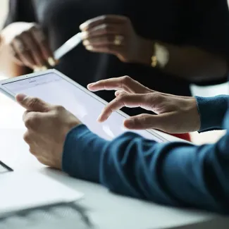 photo of a person with an ipad