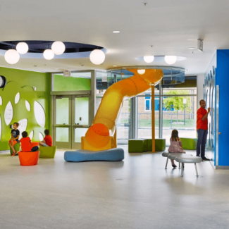 Interior of colorful room with a slide 