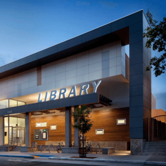 Exterior of modern library building at dusk