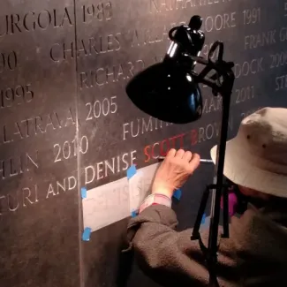 Gold Medal: The names of 2016 Gold Medal recipients Robert Venturi and Denise Scott Brown are chiseled into the Gold Medal Wall at AIA headquarters in Washington, D.C. 