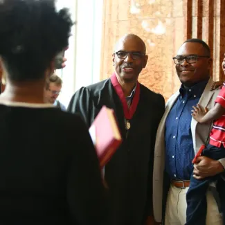 Jimmie E. Tucker, FAIA, celebrates becoming an AIA Fellow with his family during the 2019 College of Fellows Investiture Ceremony in Las Vegas.