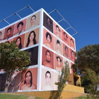 outdoor exhibit showing individuals of different ethnicities