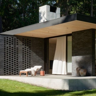 The concrete terrace of The Rambler wraps around the main living pavilion creating a strong connection to the exterior landscape and providing a welcoming corner for friends and family to gather.