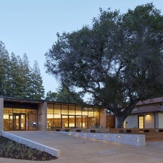 Exterior of Atherton Library at dusk.