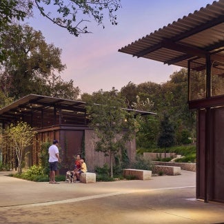 Exterior of Kingsbury Commons at Pease Park at sunset